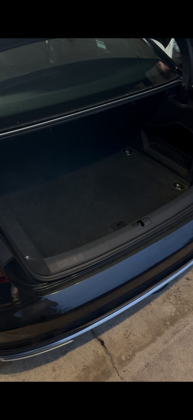 Same cargo area after detailing, fully cleaned