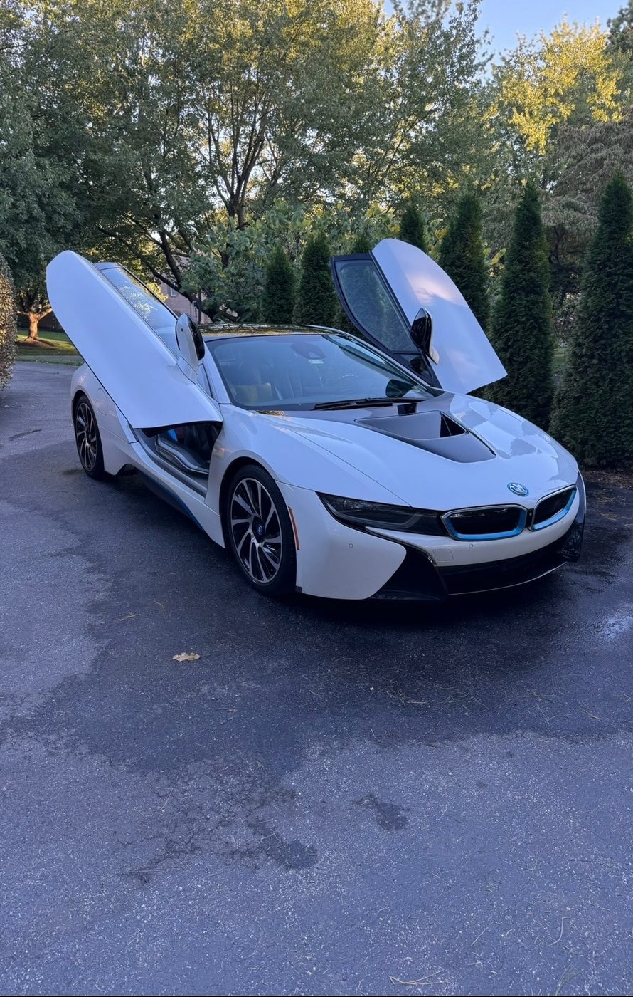 BMW i8 finished exterior with doors open, ready for pickup